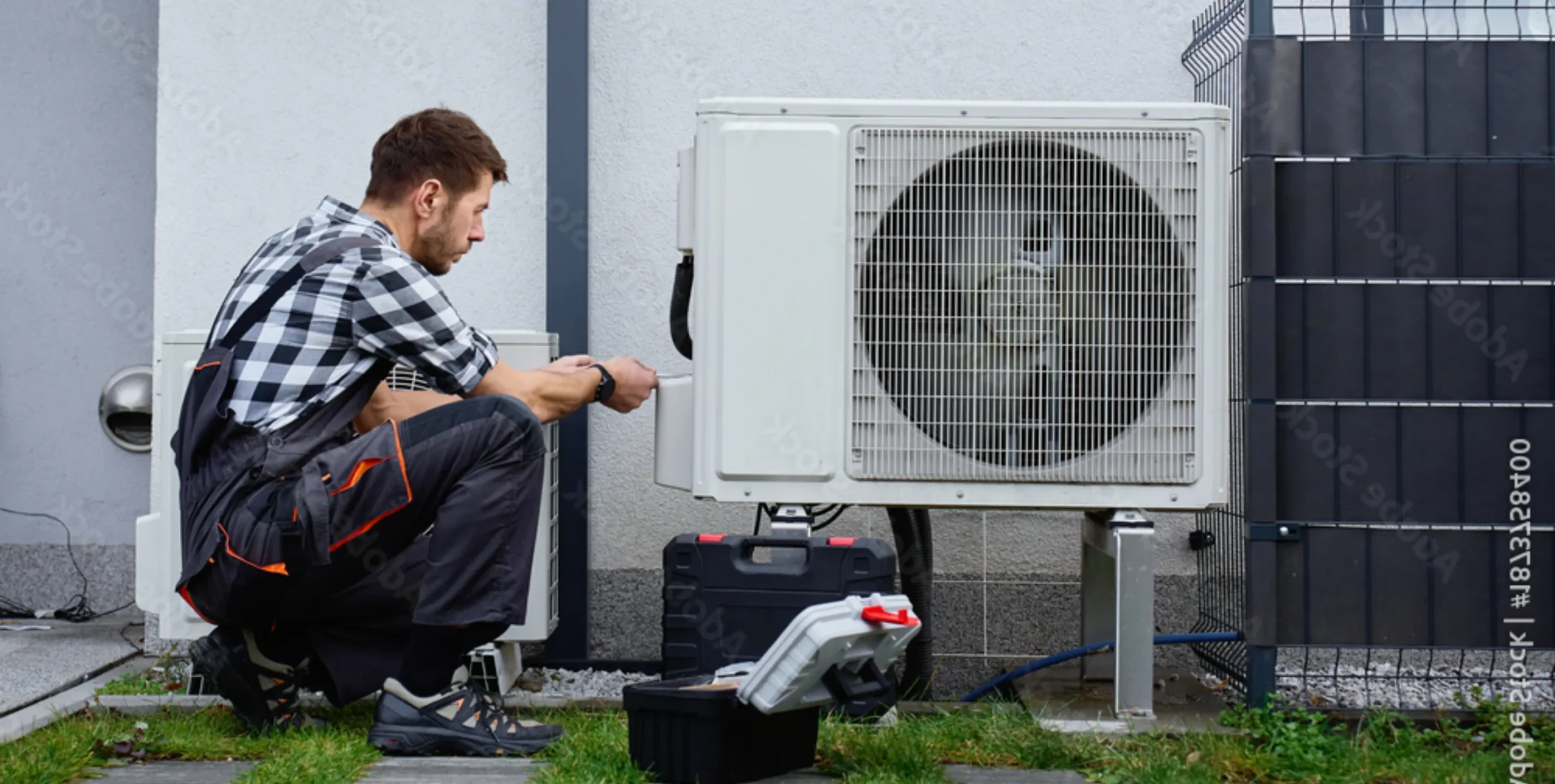 Gary Paul Mechanical employee fixing an AC unit