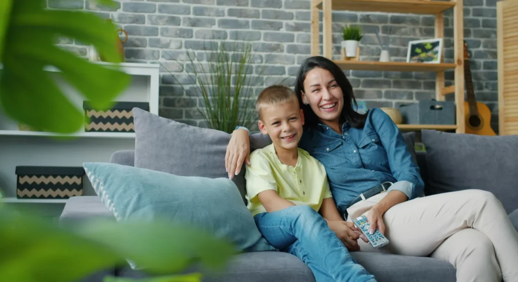 happy family sitting on couch